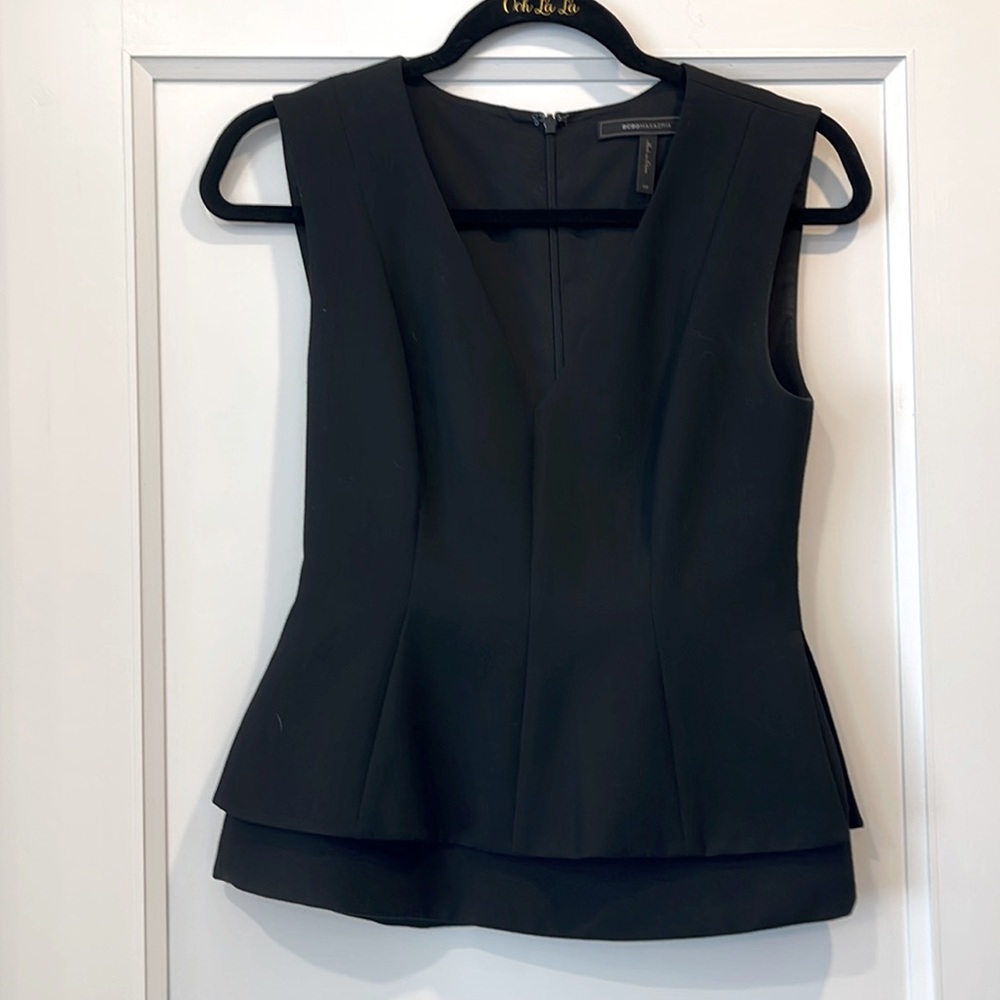 BCBG XS Black peplum top.